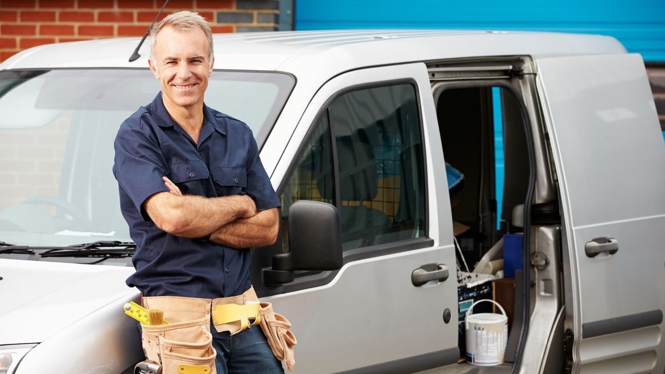 Local Gas Safe engineer beside his work van